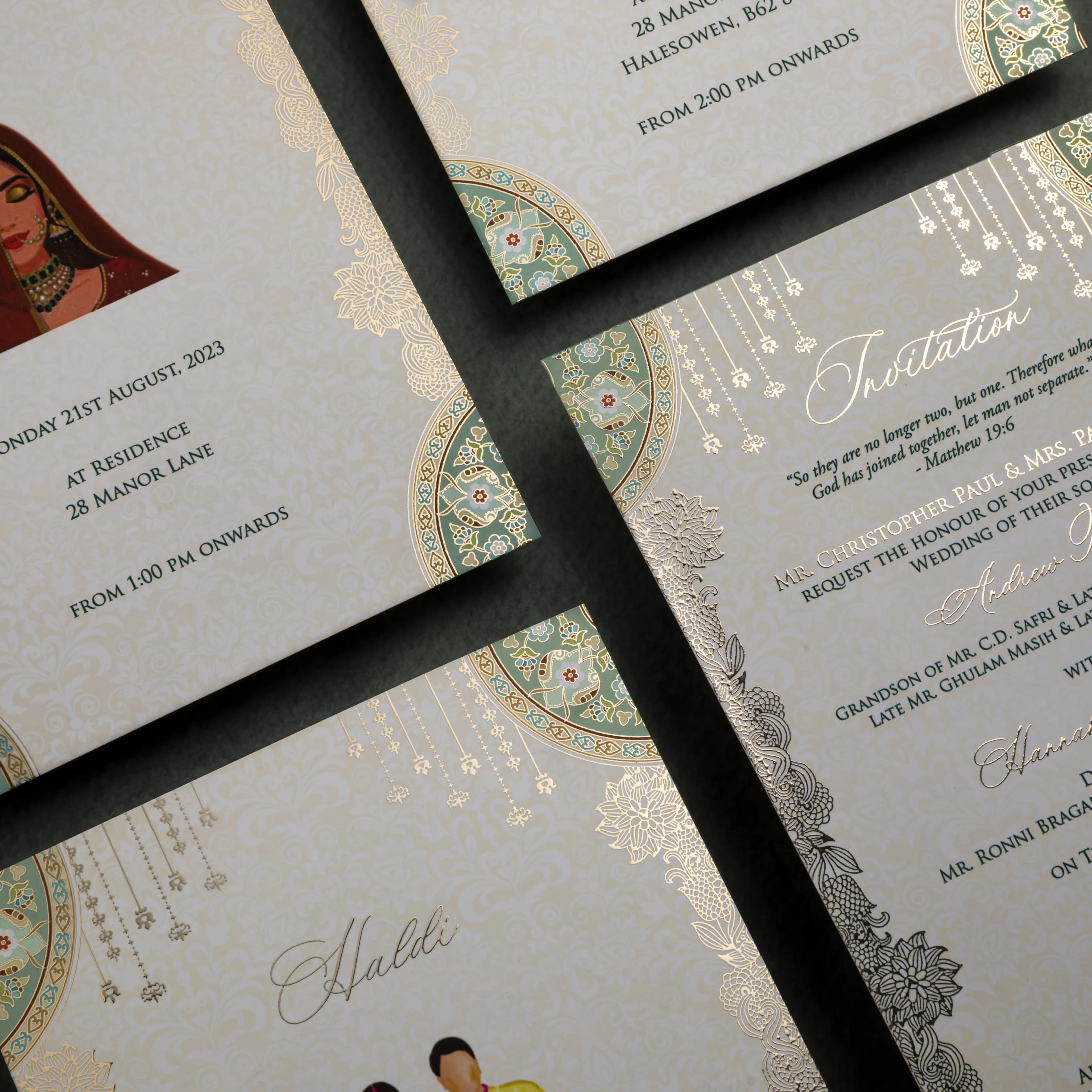 Stack of premium invitation cards with gold-foil emblem and calligraphy on a wooden surface